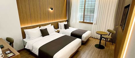 Deluxe Family Twin | Cortinas blackout, insonorización y wifi gratis