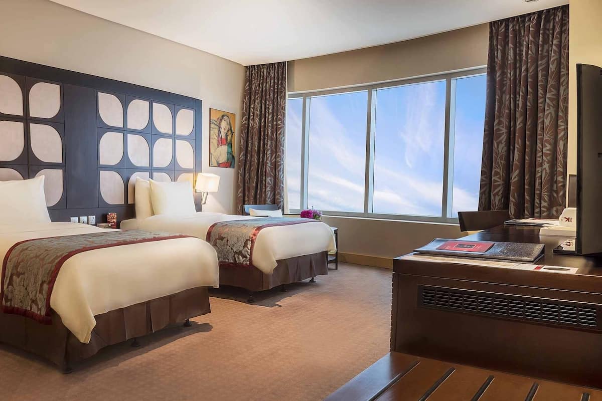 1 bedroom, hypo-allergenic bedding, down comforters, minibar