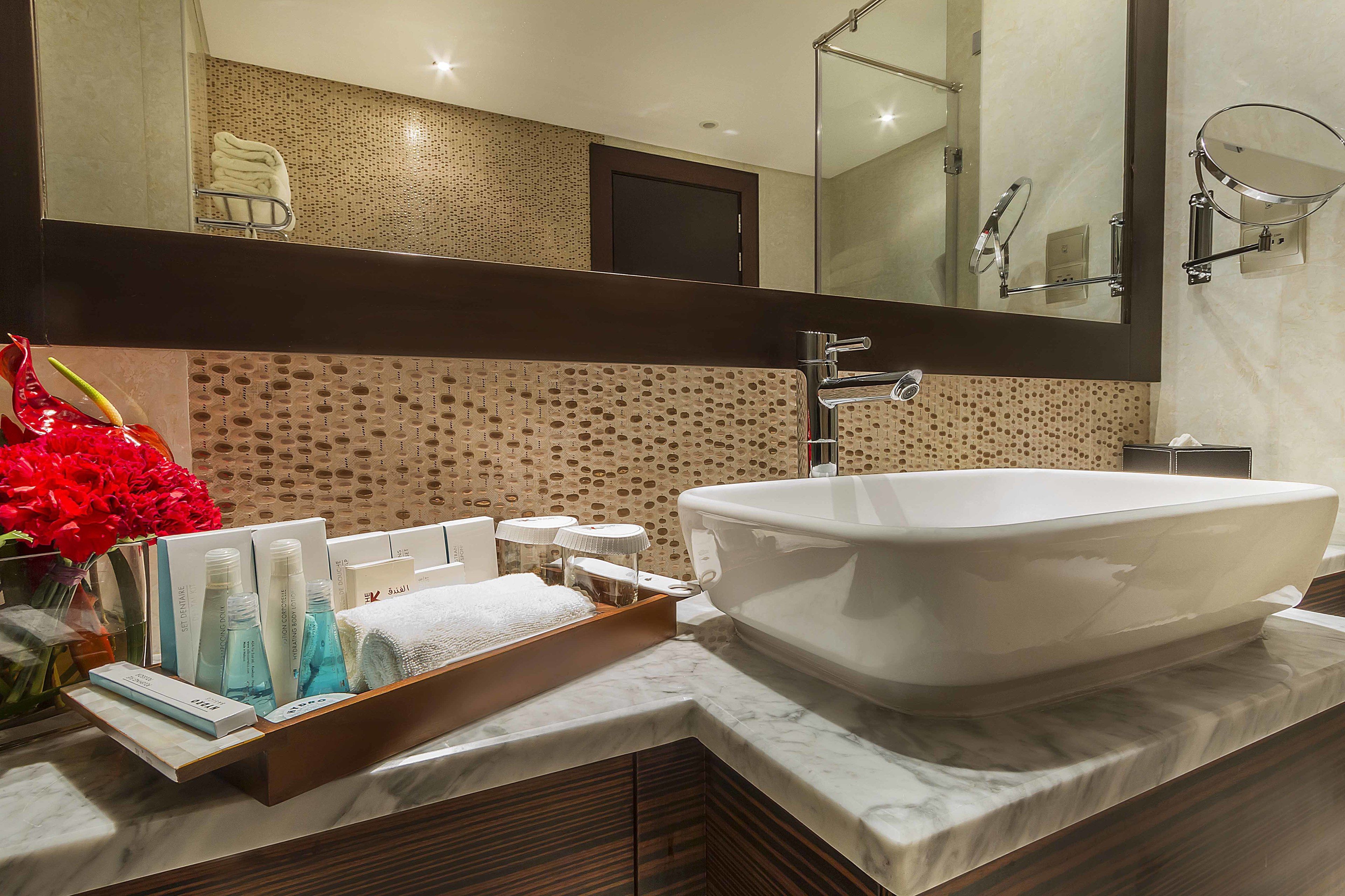 separate bathtub and shower, hair dryer, bathrobes, slippers