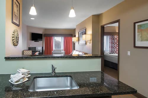 Suite, 1 Bedroom | Private kitchen | Microwave, stovetop, dishwasher, coffee/tea maker