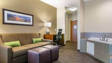 Suite, 1 King Bed with Sofa bed, Jetted Tub | Hypo-allergenic bedding, pillowtop beds, in-room safe, desk