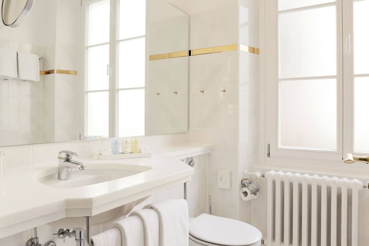 double room, lake view | bathroom | combined shower/bathtub, hair dryer, bathrobes, slippers