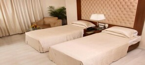Executive Double or Twin Room | Minibar, in-room safe, individually decorated, individually furnished - The Chevron Orchards (Bengaluru)