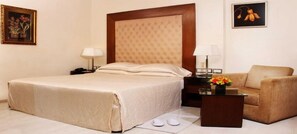 Minibar, in-room safe, individually decorated, individually furnished - The Chevron Orchards (Bengaluru)