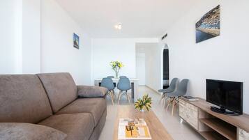 Apartment, 2 Bedrooms, Balcony, Harbor View | Living area | 30-inch flat-screen TV with digital channels, TV