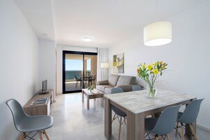 Superior Apartment, 2 Bedrooms, Balcony, Sea View | Living area | 30-inch flat-screen TV with digital channels, TV