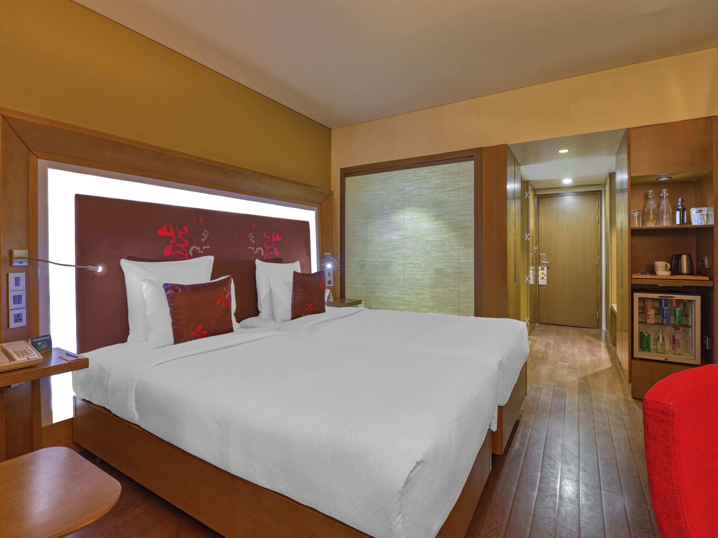 Premium bedding, down duvets, minibar, in-room safe