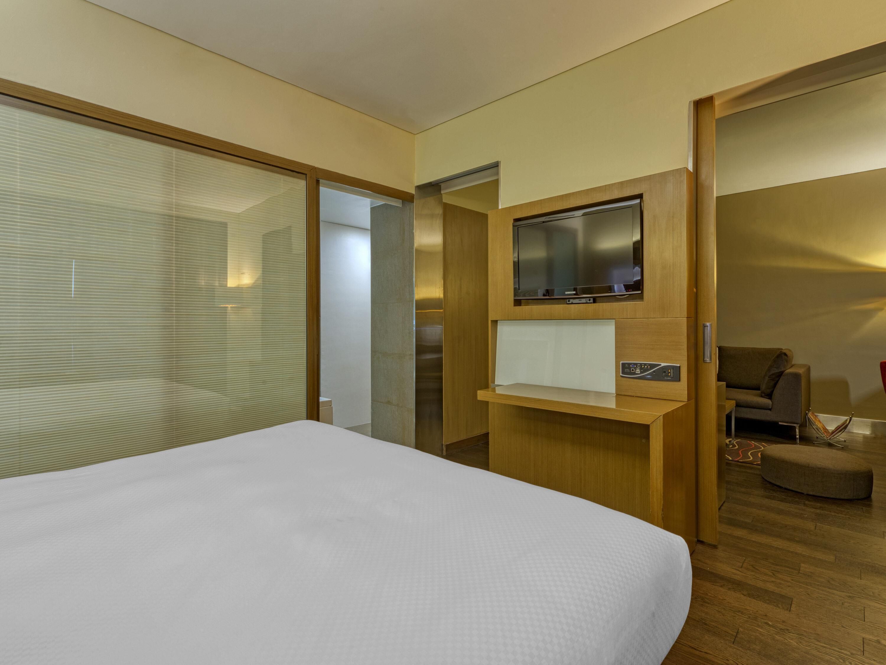 Suite Exécutive, 1 lit double | Literie de qualité supérieure, couette en duvet d'oie, minibar