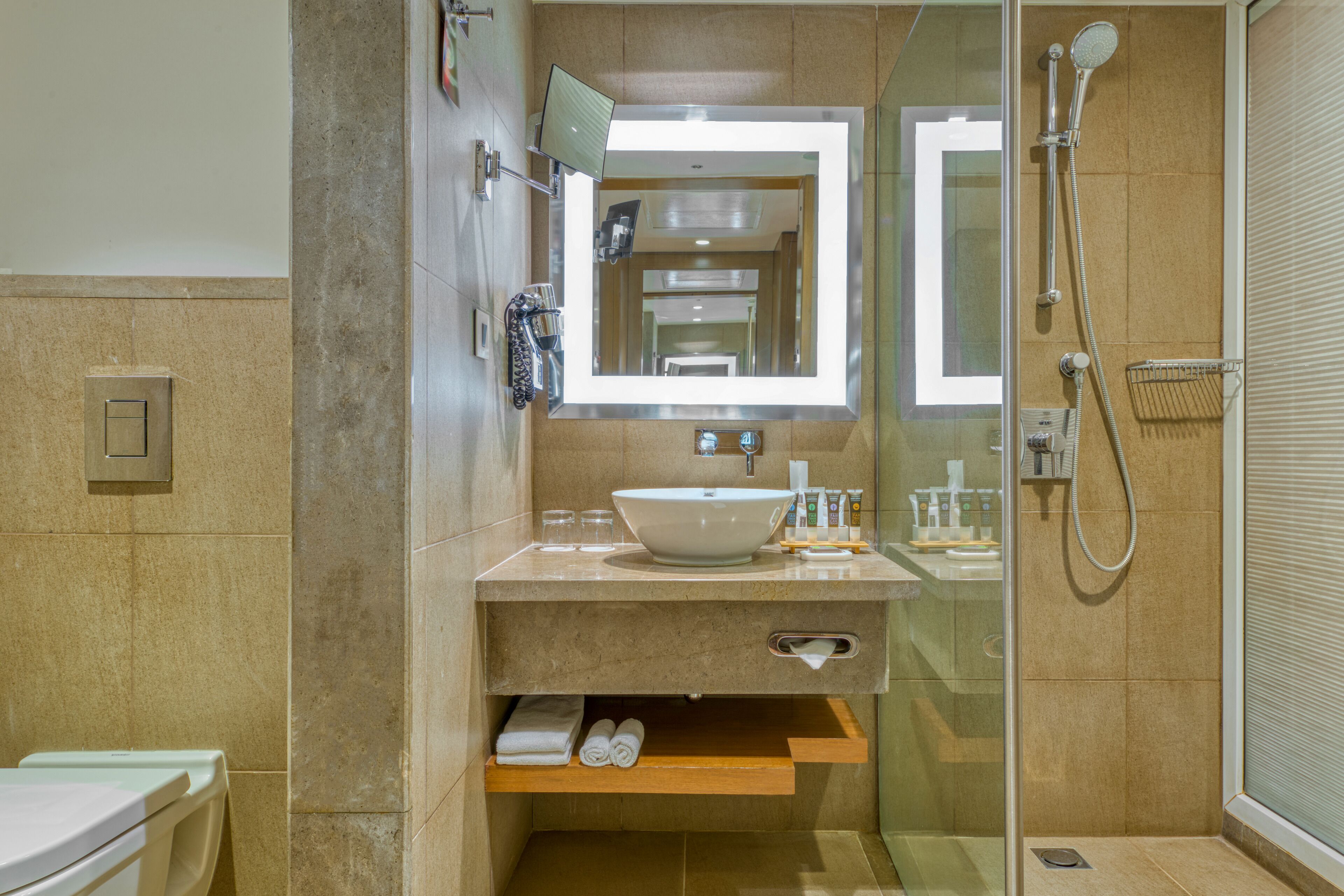 executive room, 1 king bed | bathroom | eco-friendly toiletries, hair dryer, bathrobes, slippers