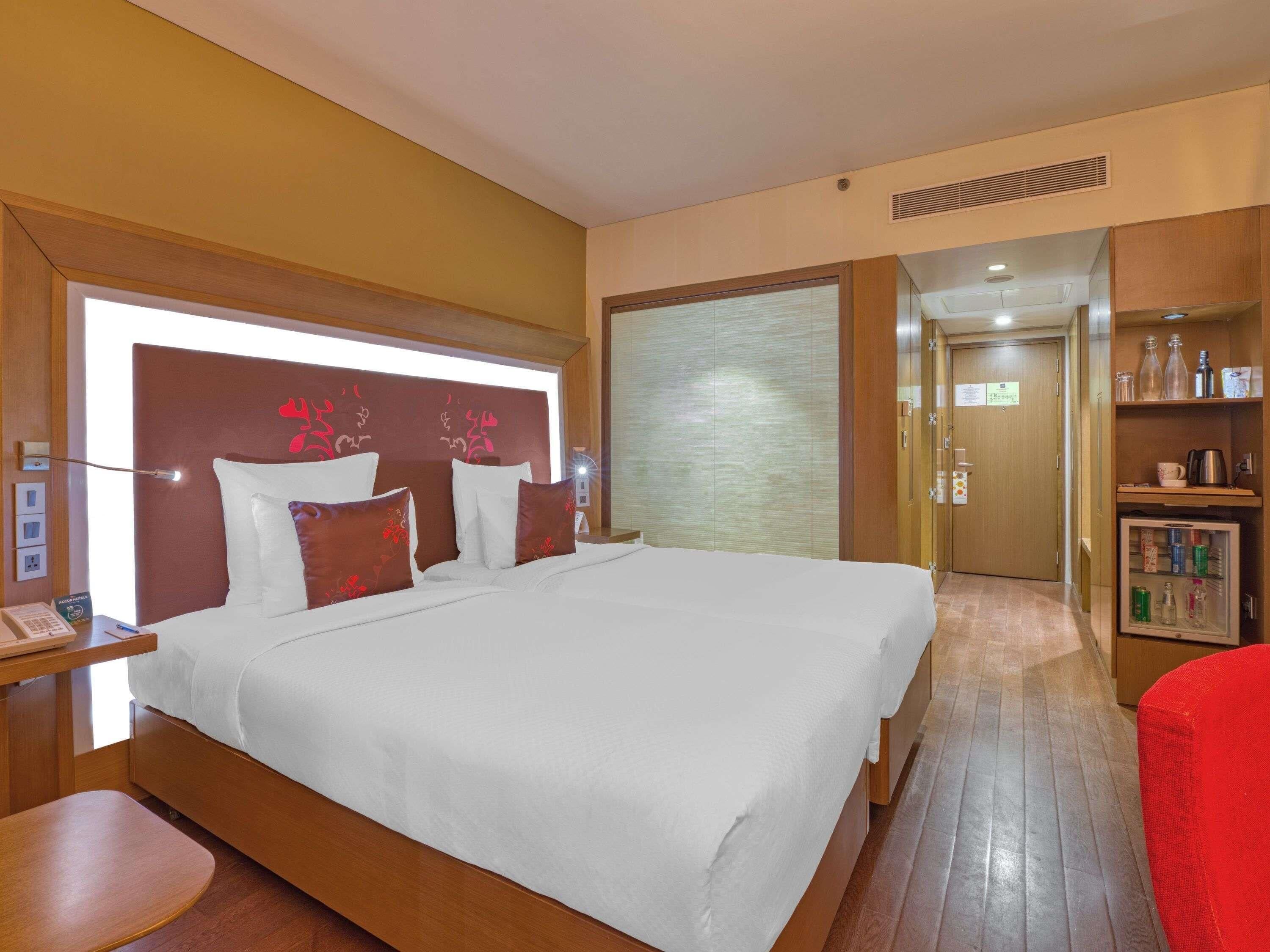 Premium bedding, down duvets, minibar, in-room safe