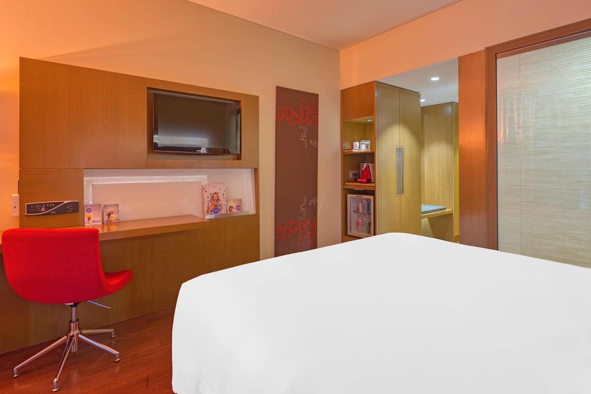 Premium bedding, down duvets, minibar, in-room safe