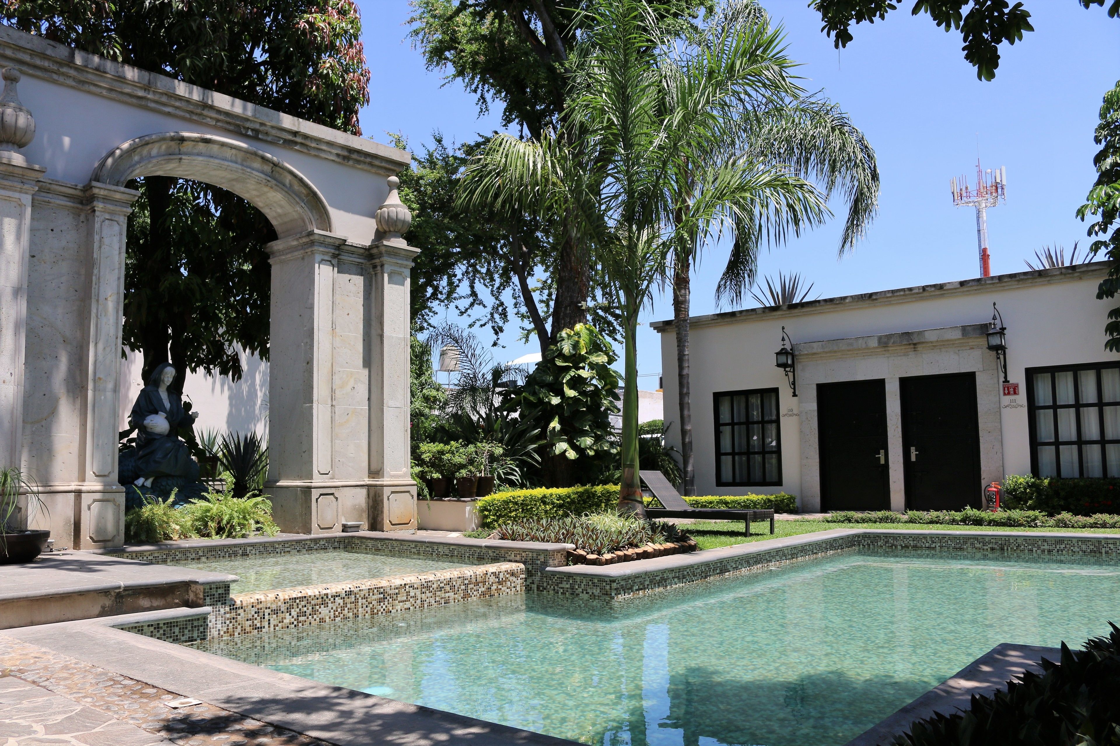 outdoor pool, pool umbrellas, pool loungers