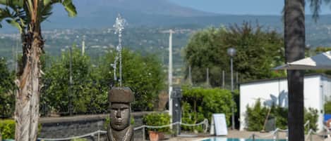 2 outdoor pools, pool umbrellas, pool loungers