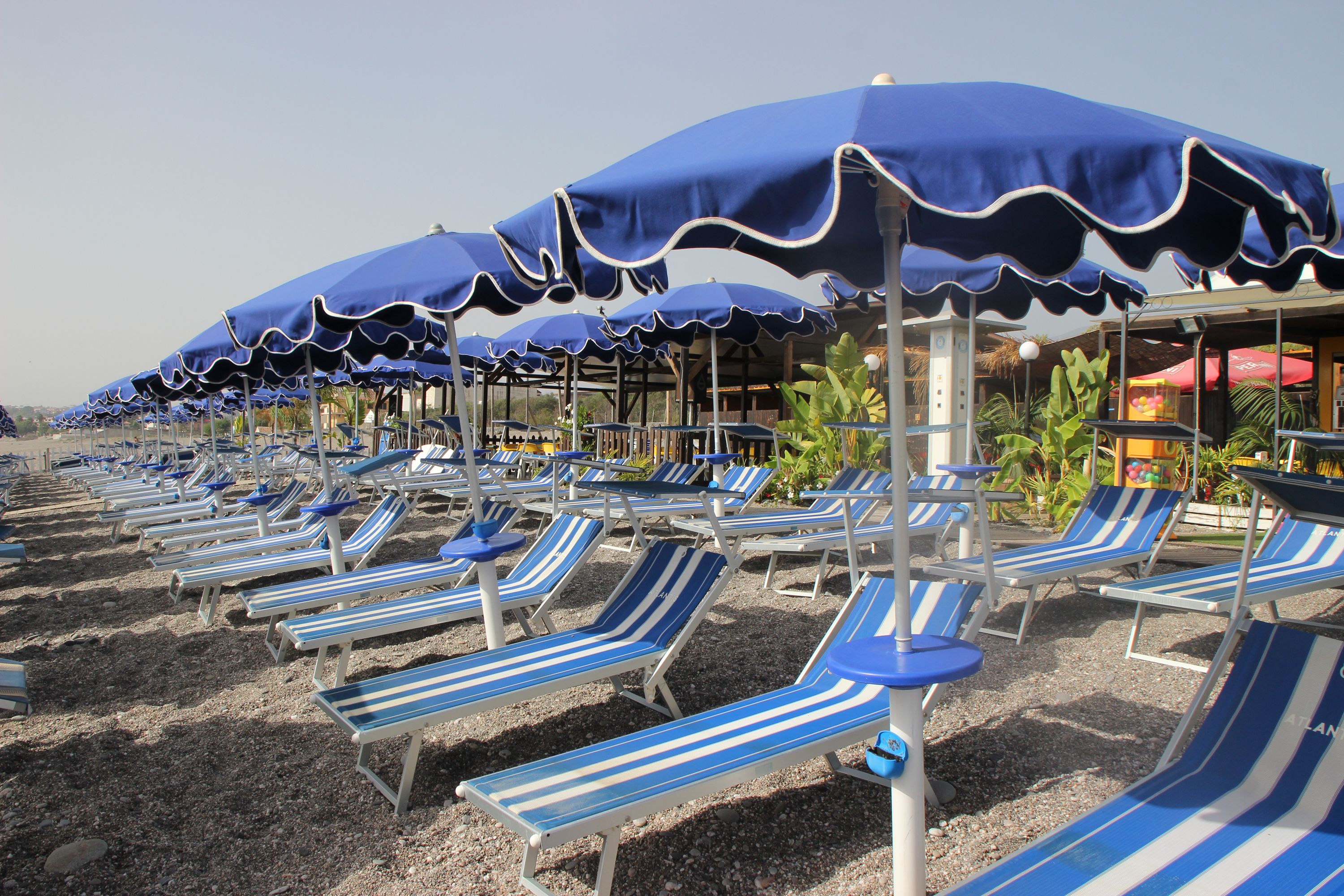 private beach, sun-loungers, beach umbrellas, beach towels