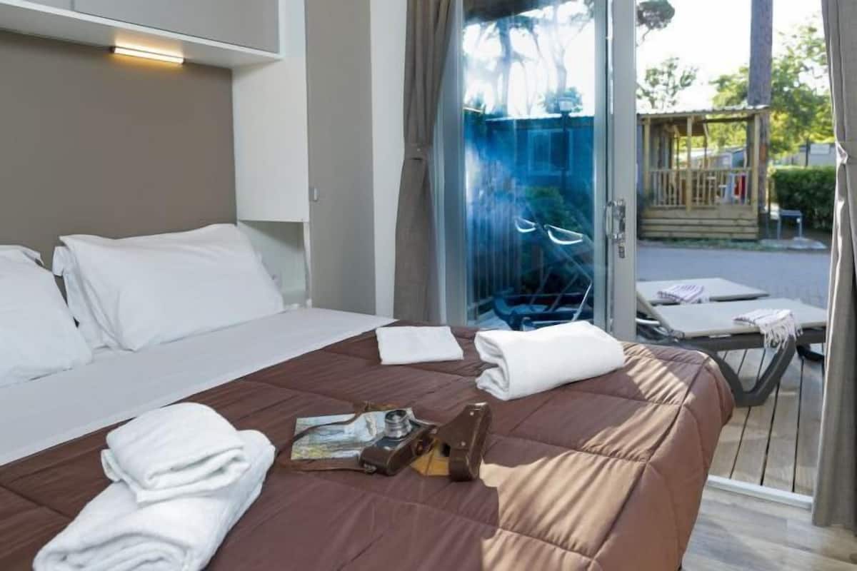 2 habitaciones y ropa de cama