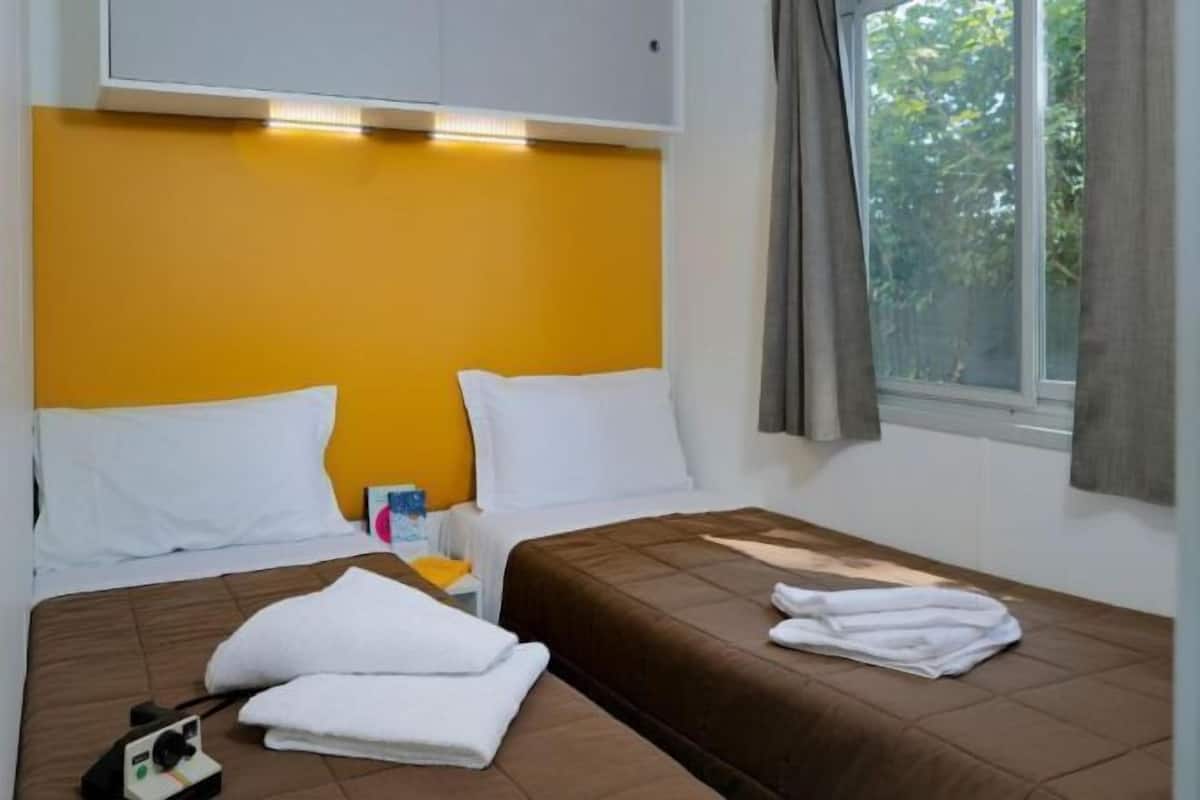 2 habitaciones y ropa de cama