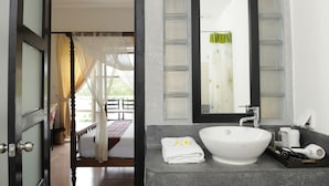 Deluxe Room, 1 King Bed, Balcony, Pool View | Bathroom sink - Amber Angkor Villa Hotel & Spa (Siem Reap)