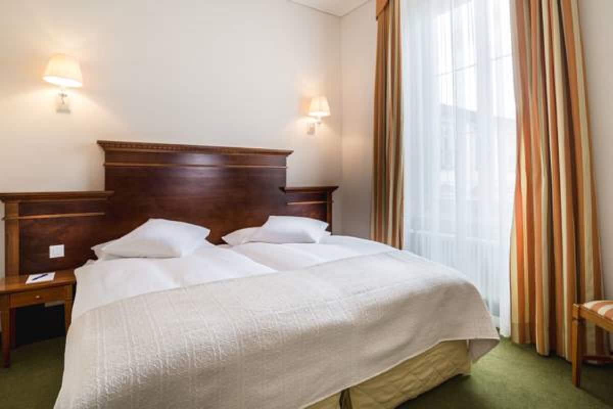 Superior tweepersoonskamer | Een minibar, een kluis op de kamer, gratis wifi, beddengoed