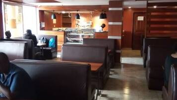 Breakfast, lunch, dinner served; local cuisine