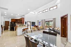 Luxury Suite | Living area | 60-inch TV with cable channels, foosball, table tennis
