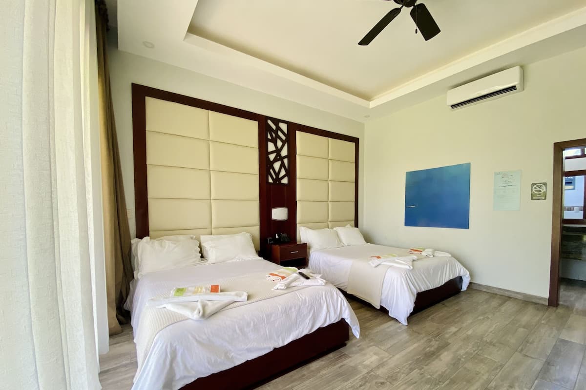 Premium Double Room, 2 Queen Beds, Garden View | Premium bedding, in-room safe, individually decorated