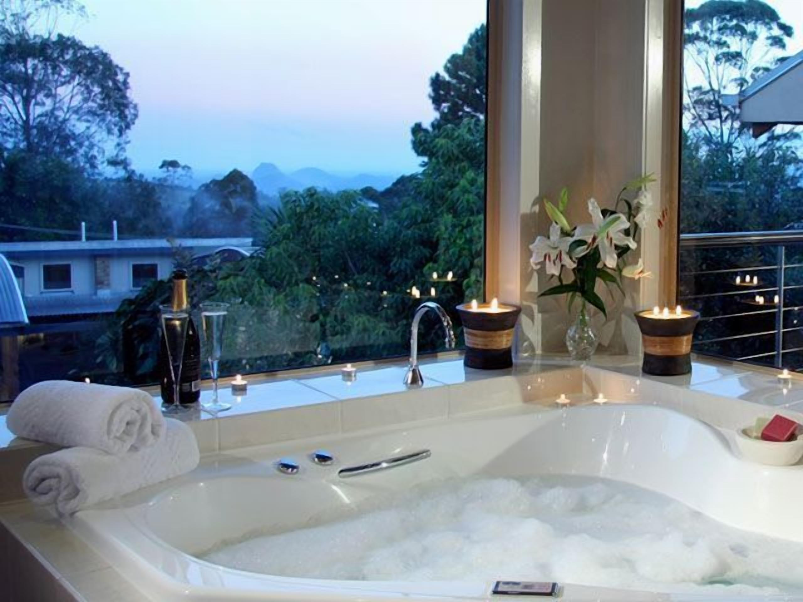 penthouse, 2 bedrooms, mountain view | bathroom | shower, rainfall showerhead, free toiletries, hair dryer