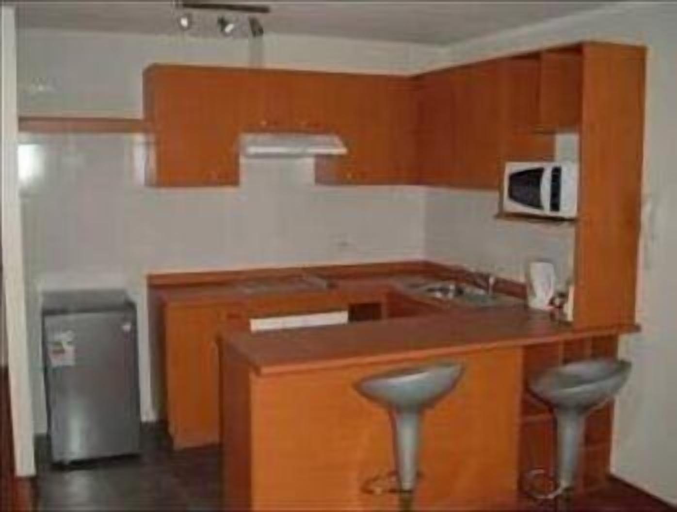 Fridge, microwave, coffee/tea maker, cookware/dishes/utensils