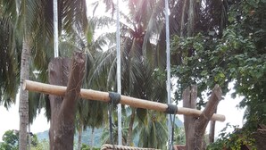 A wooden signboard with the text 'ASEANIA BEACH RESORT BESAR MERSING ISLAND JOHOR'. - Aseania Resort Pulau Besar (Pulau Besar)