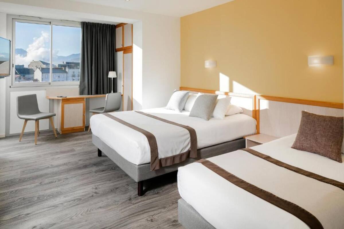 Quadruple Room | Premium bedding, in-room safe, desk, soundproofing