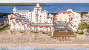 A resort with multiple buildings, a pool, and a beach. - GR Solaris Caribe Adults Only - All Inclusive (Cancun)