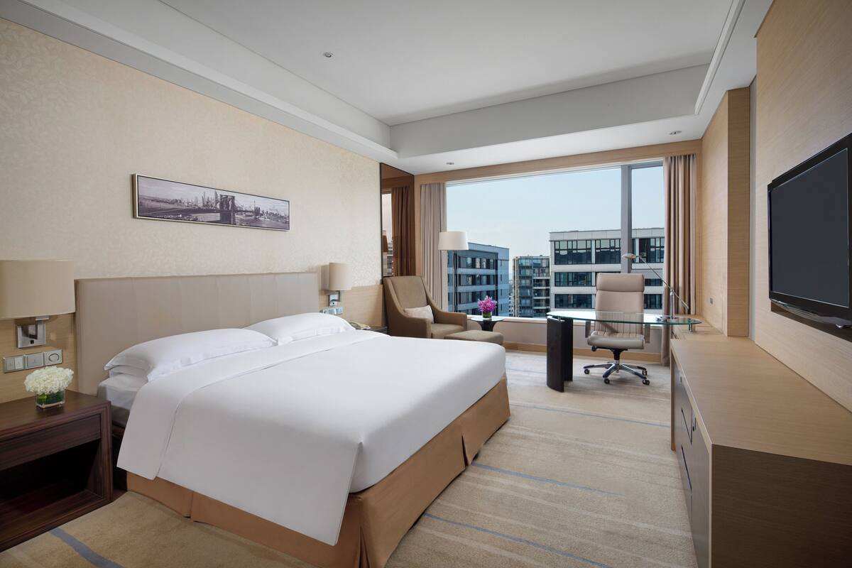 Premium bedding, down comforters, memory foam beds, minibar