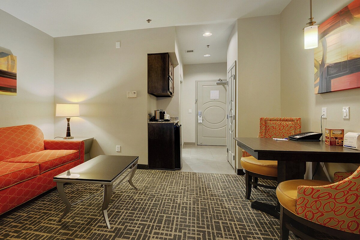 Suite, 2 Queen Beds | Desk, blackout drapes, iron/ironing board, cribs (free)