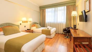 Executive Twin Room | Minibar, in-room safe, desk, laptop workspace