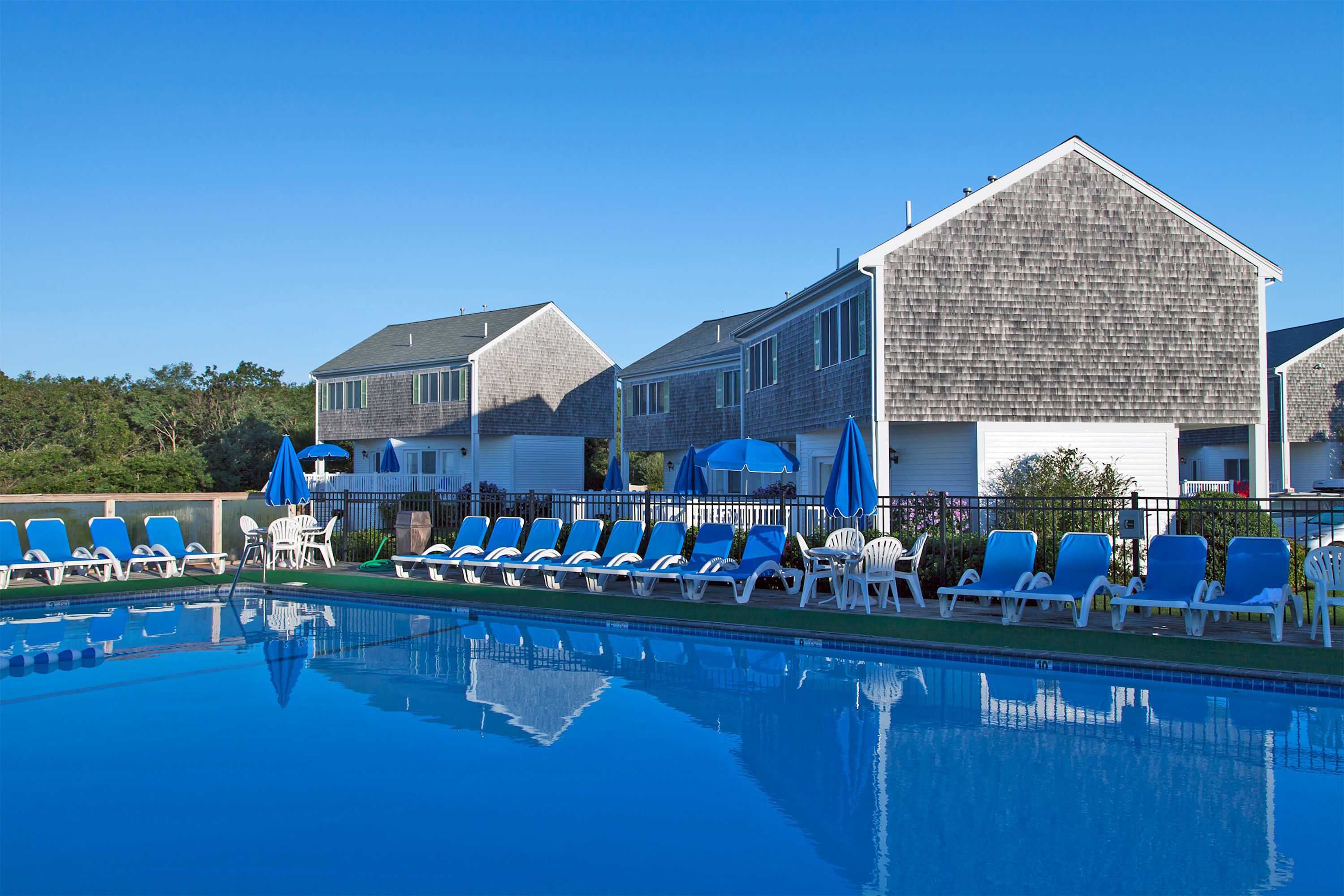outdoor pool, open 8:30 am to 9:00 pm, pool umbrellas, pool loungers