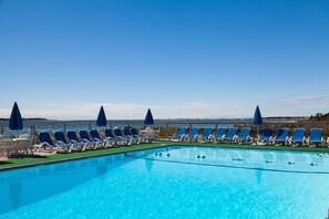 Outdoor pool, open 8:30 AM to 9:00 PM, pool umbrellas, pool loungers