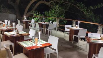 Breakfast, lunch, dinner served; Mediterranean cuisine, beach views