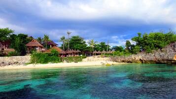 Private beach, white sand, sun-loungers, beach umbrellas