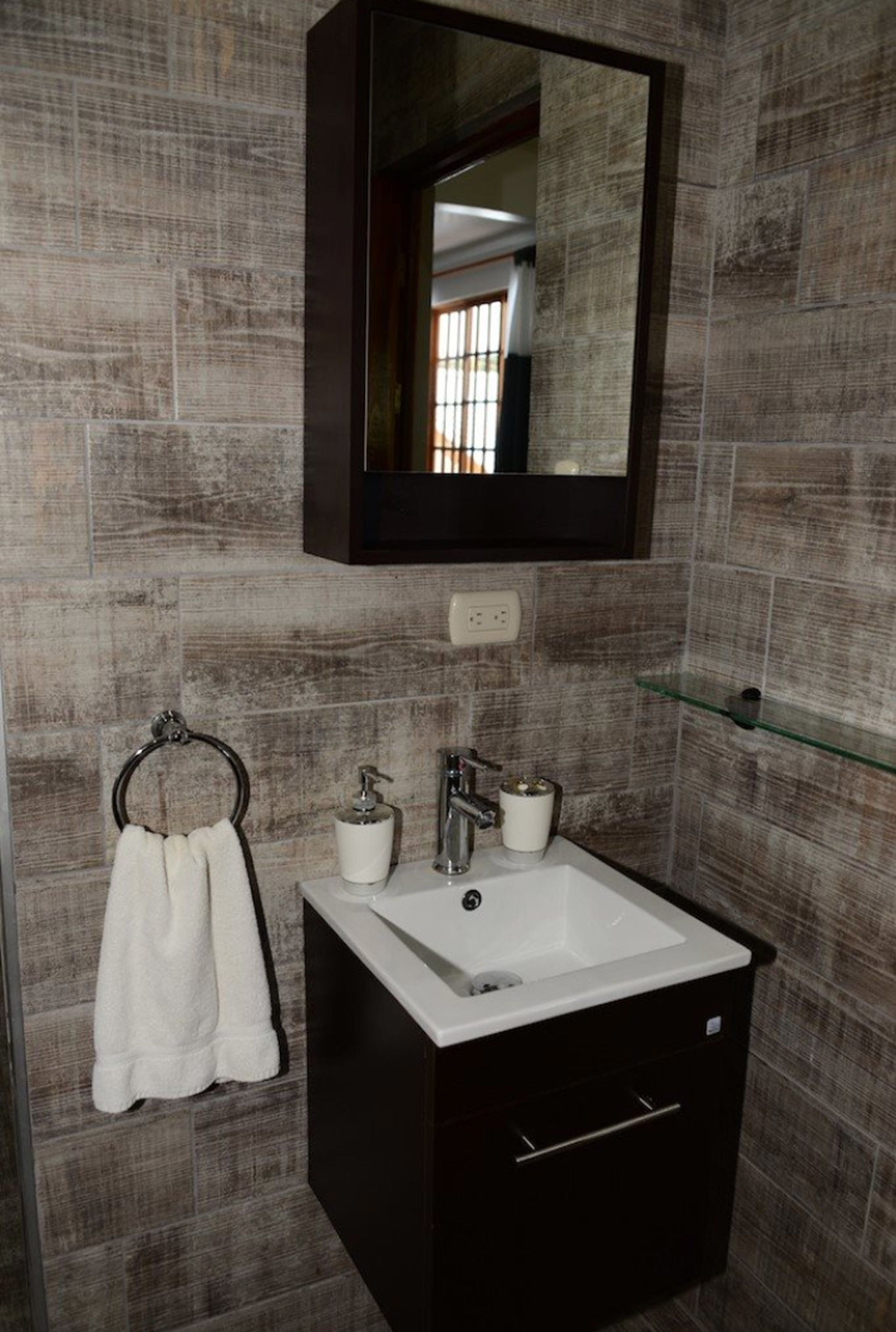 suite, 2 queen beds | bathroom | shower, hair dryer, towels