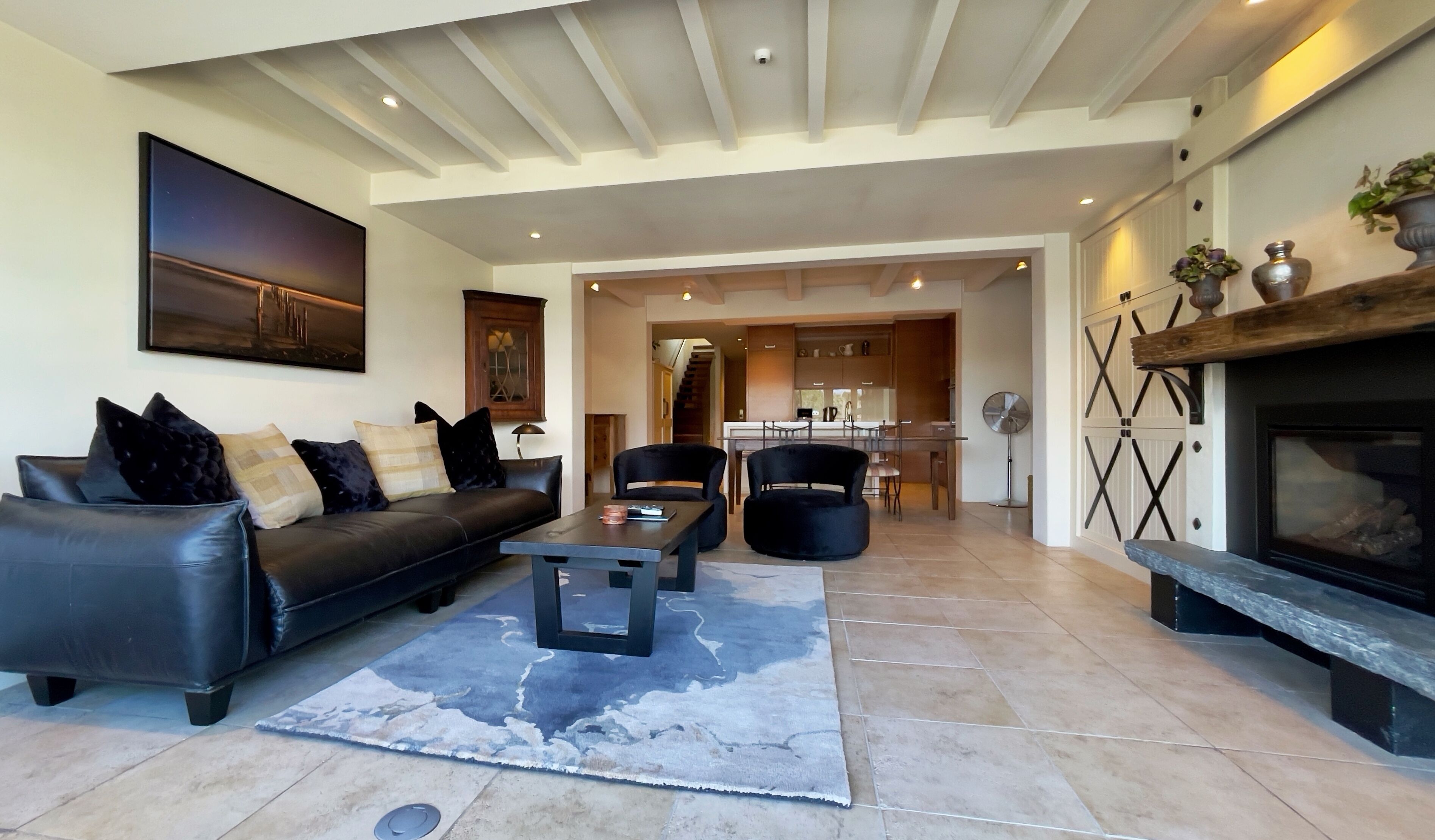 Executive Penthouse, 2 Bedrooms | Living area | 40-inch TV with satellite channels, fireplace