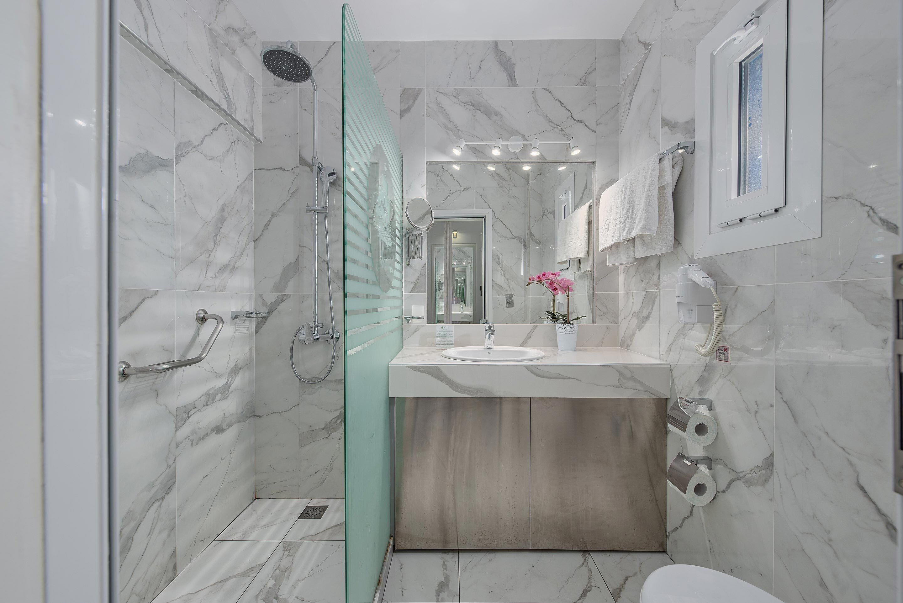 shower, free toiletries, hair dryer, slippers