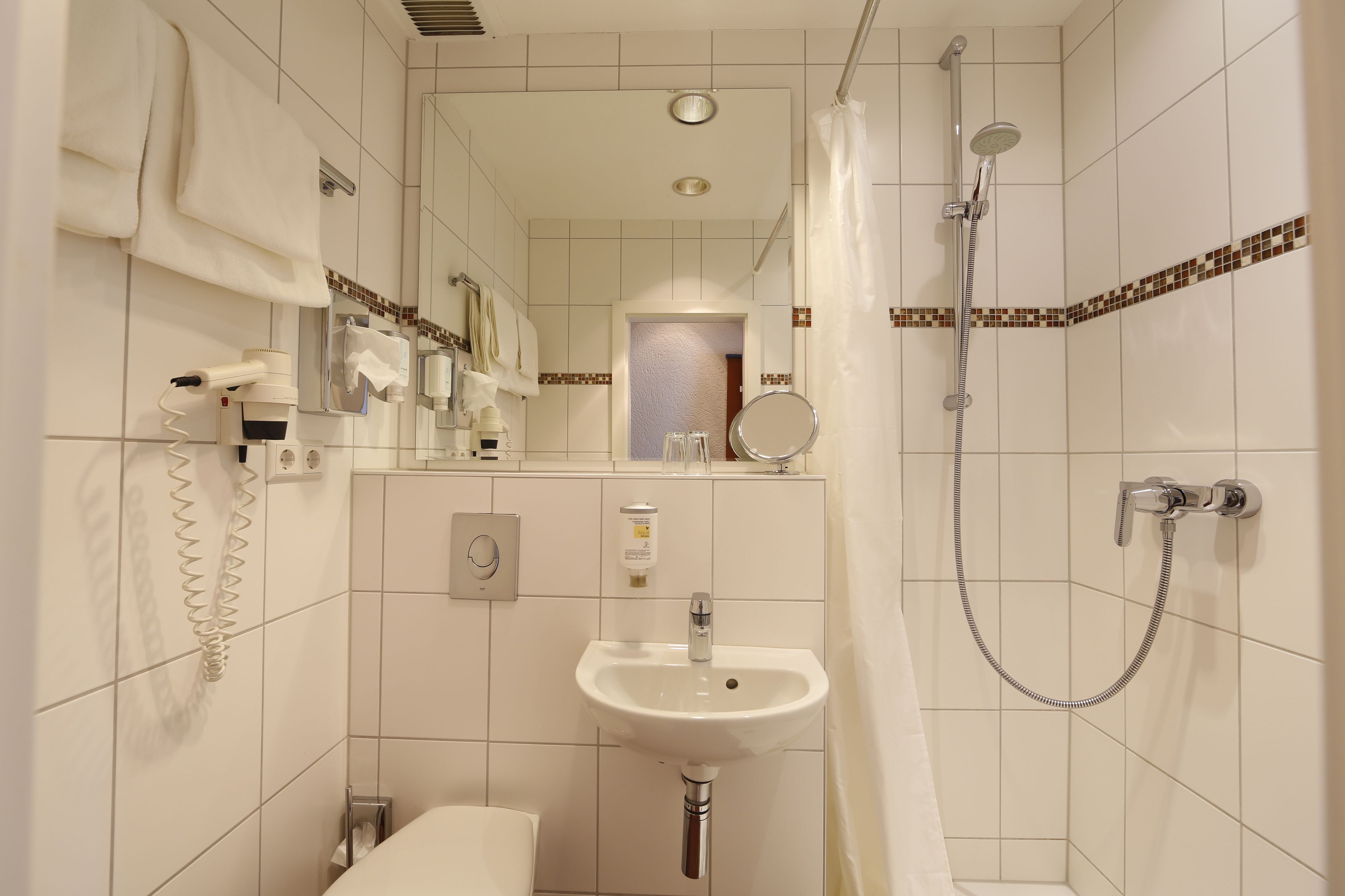 double room, balcony, river view | bathroom | shower, free toiletries, hair dryer, towels