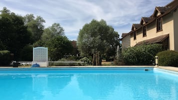 Outdoor pool, pool umbrellas, pool loungers
