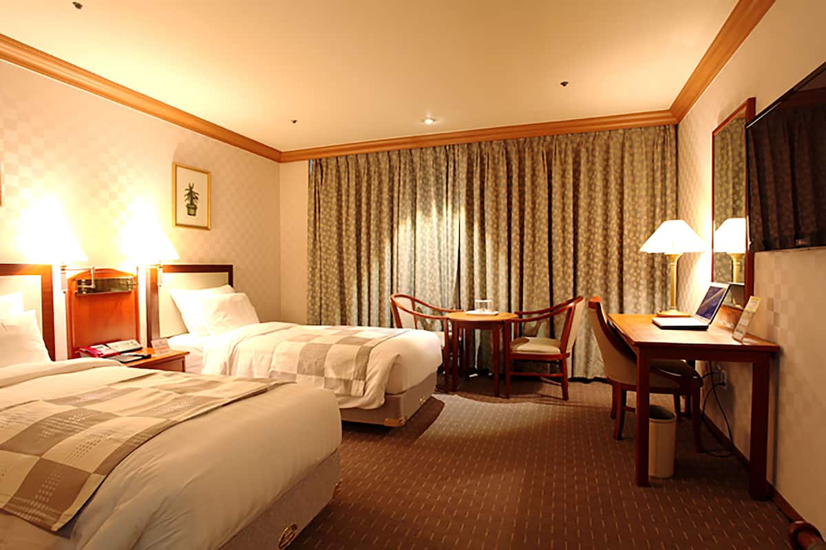 Premium bedding, desk, blackout drapes, iron/ironing board