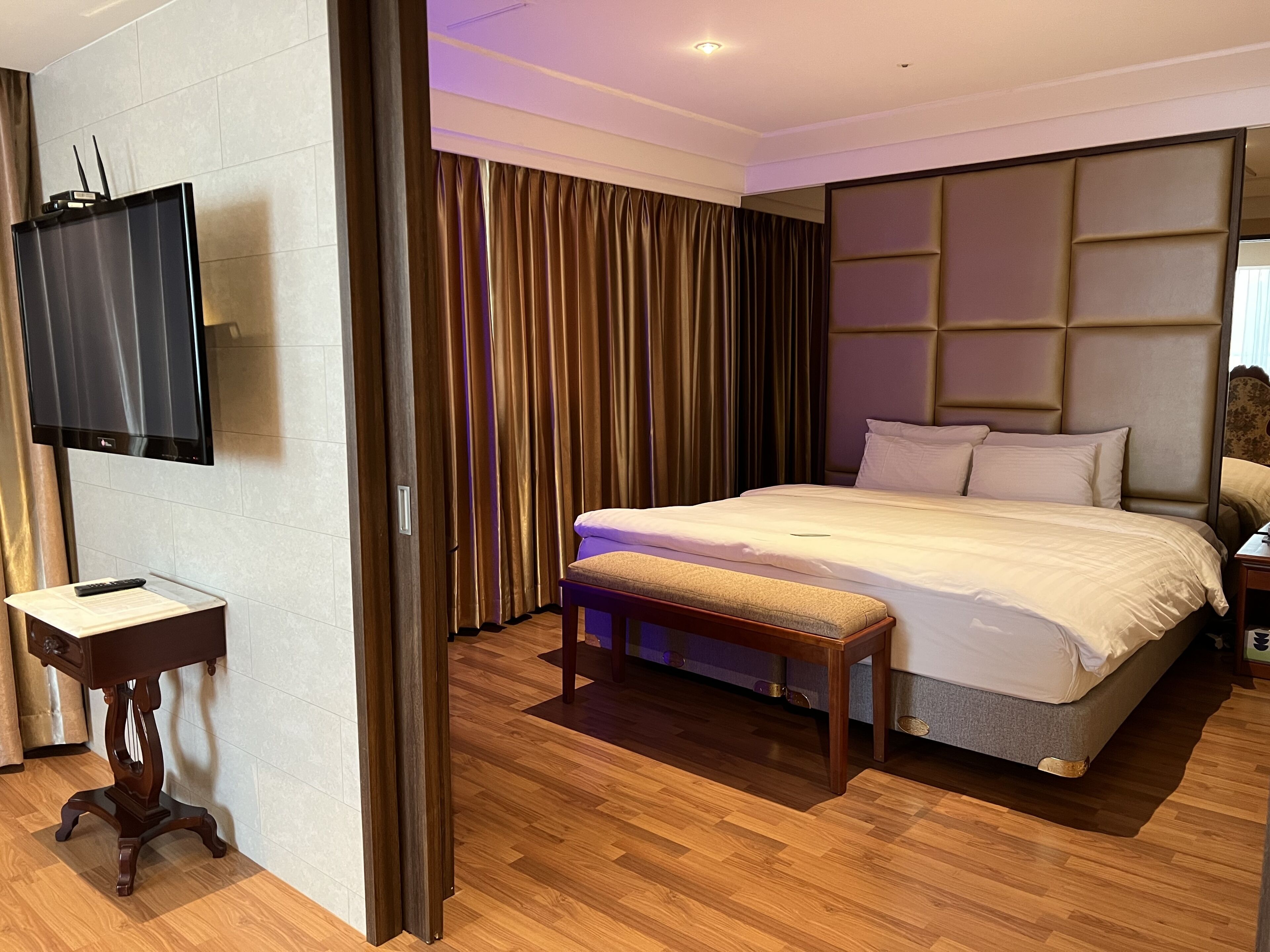 Luxury Suite | Premium bedding, desk, blackout drapes, iron/ironing board