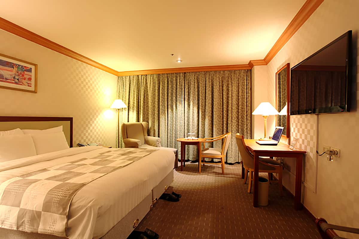 Premium bedding, desk, blackout drapes, iron/ironing board