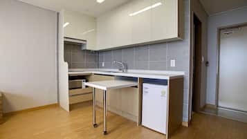 Condo Type(Kitchen) - Superior Double Studio(Half Ocean View) | Private kitchen | Fridge, electric kettle