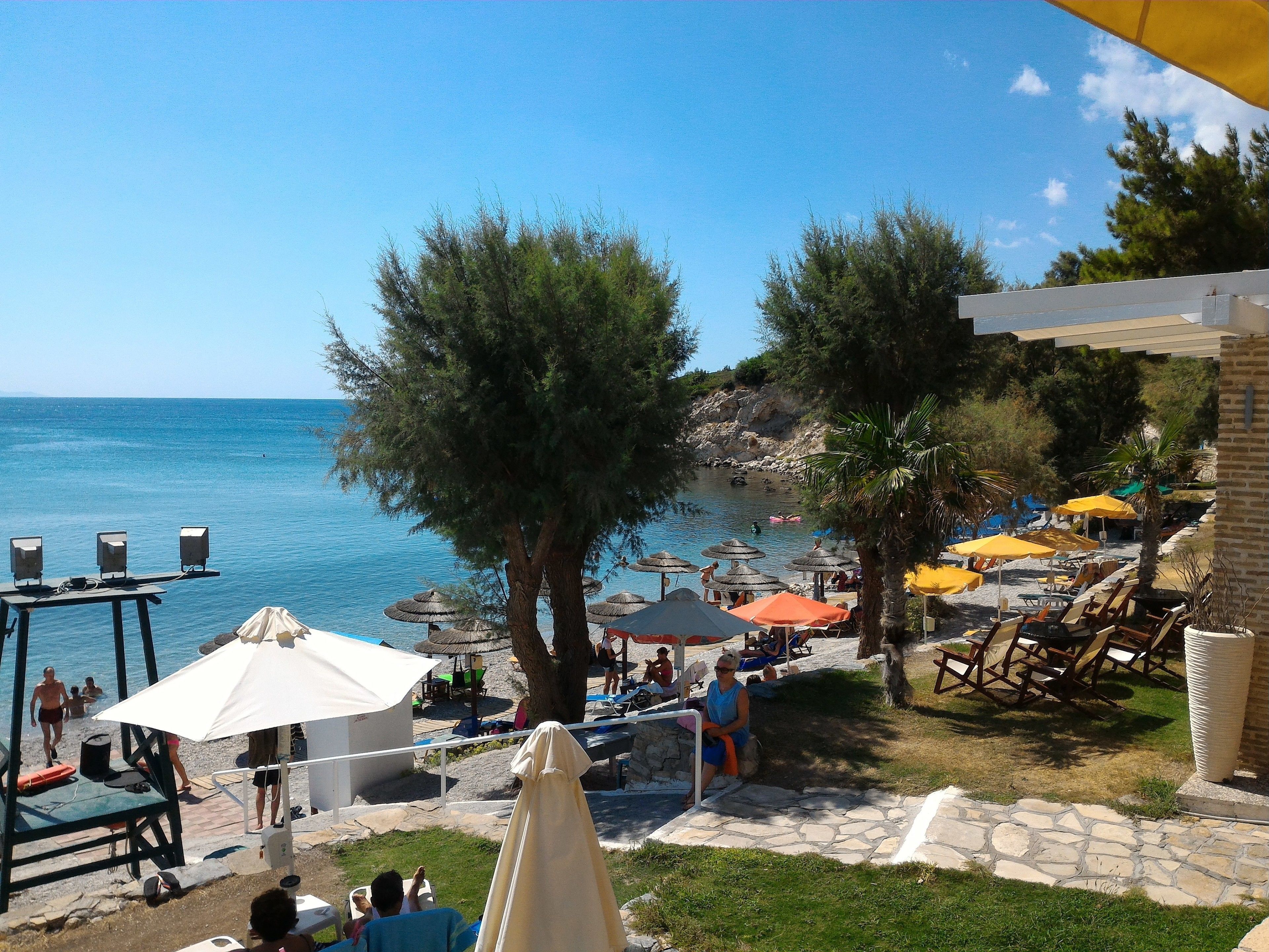 On the beach, sun loungers, beach umbrellas, beach towels