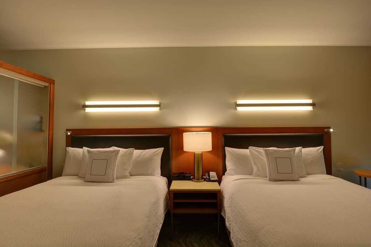 premium bedding, desk, blackout curtains, iron/ironing board