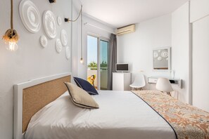 Family Room, 2 Bedrooms, Sea View | Laptop workspace, blackout drapes, iron/ironing board, free WiFi - Mrs Chryssana Beach Hotel (Platanias)