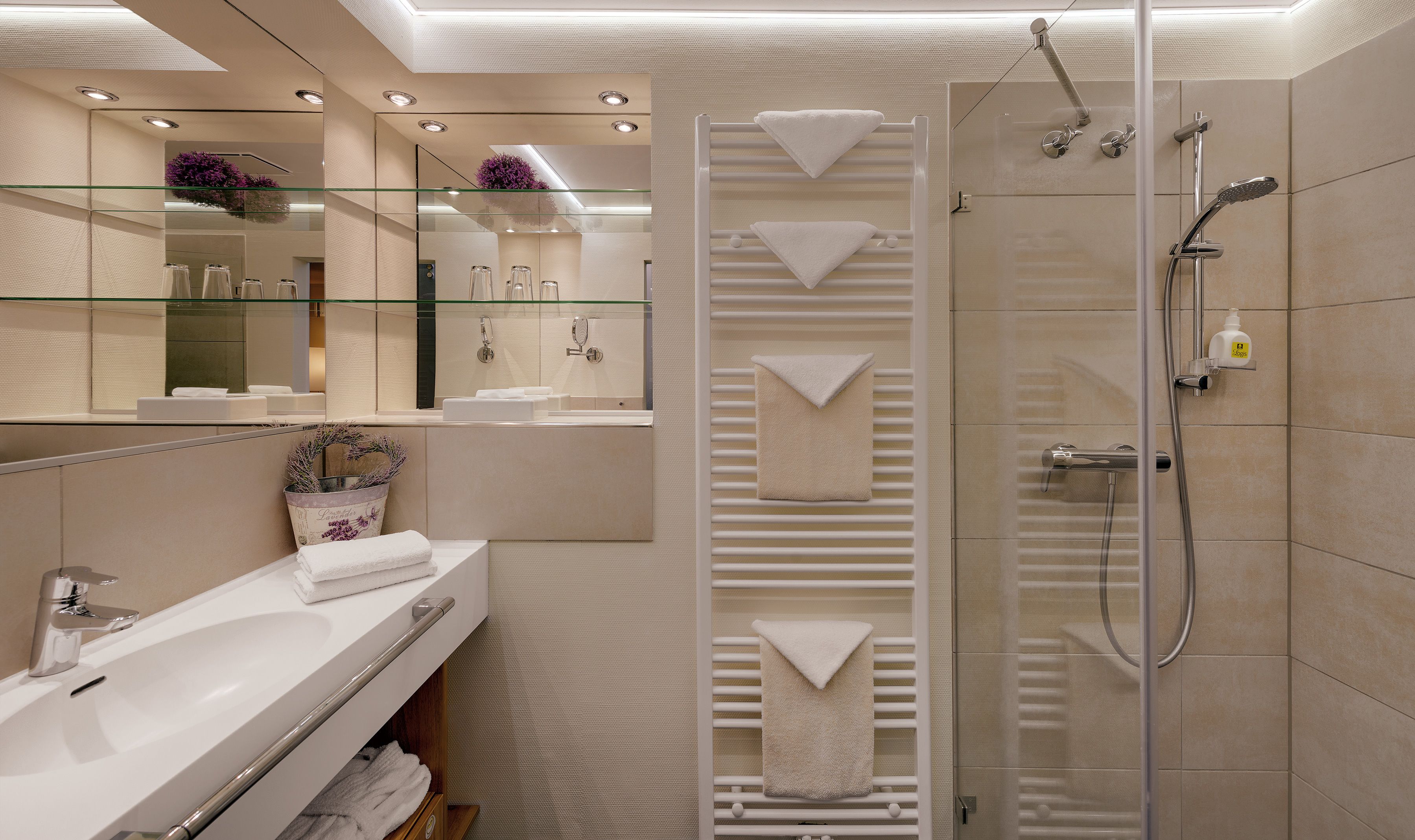 shower, hair dryer, bathrobes, towels